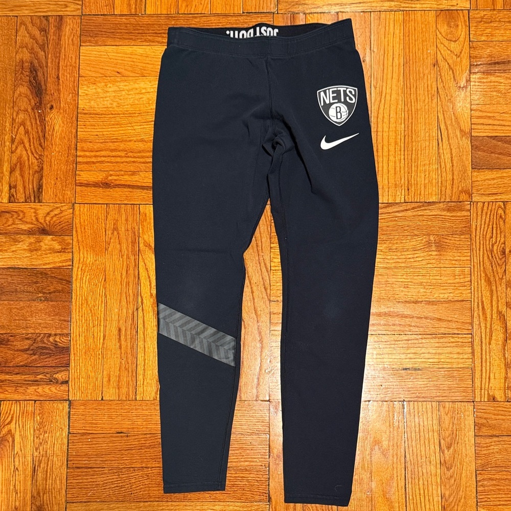 Nike Women’s Black Leggings with Nets Logo